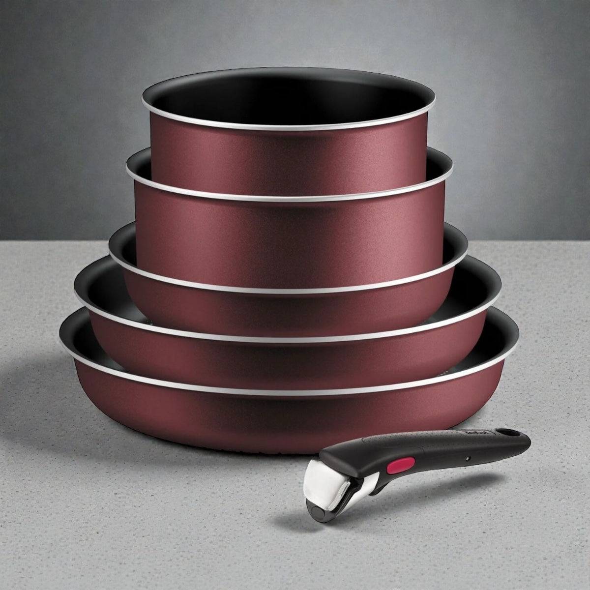 Set aus stapelbaren Pfannen mit Antihaftbeschichtung und abnehmbarem Griff, platzsparend und ideal für vielseitiges Kochen