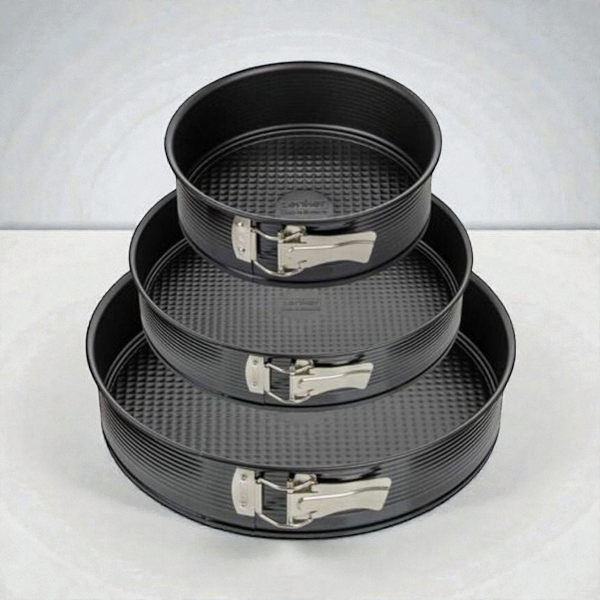 Set aus 3 runden Springformen mit herausnehmbarem Boden, antihaftbeschichtet, ideal für Kuchen und Torten