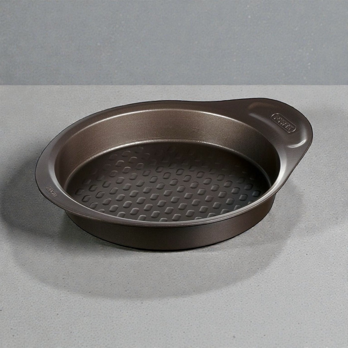 Runde Backform aus Metall mit Antihaftbeschichtung und strukturiertem Boden, ideal für Kuchen und Aufläufe