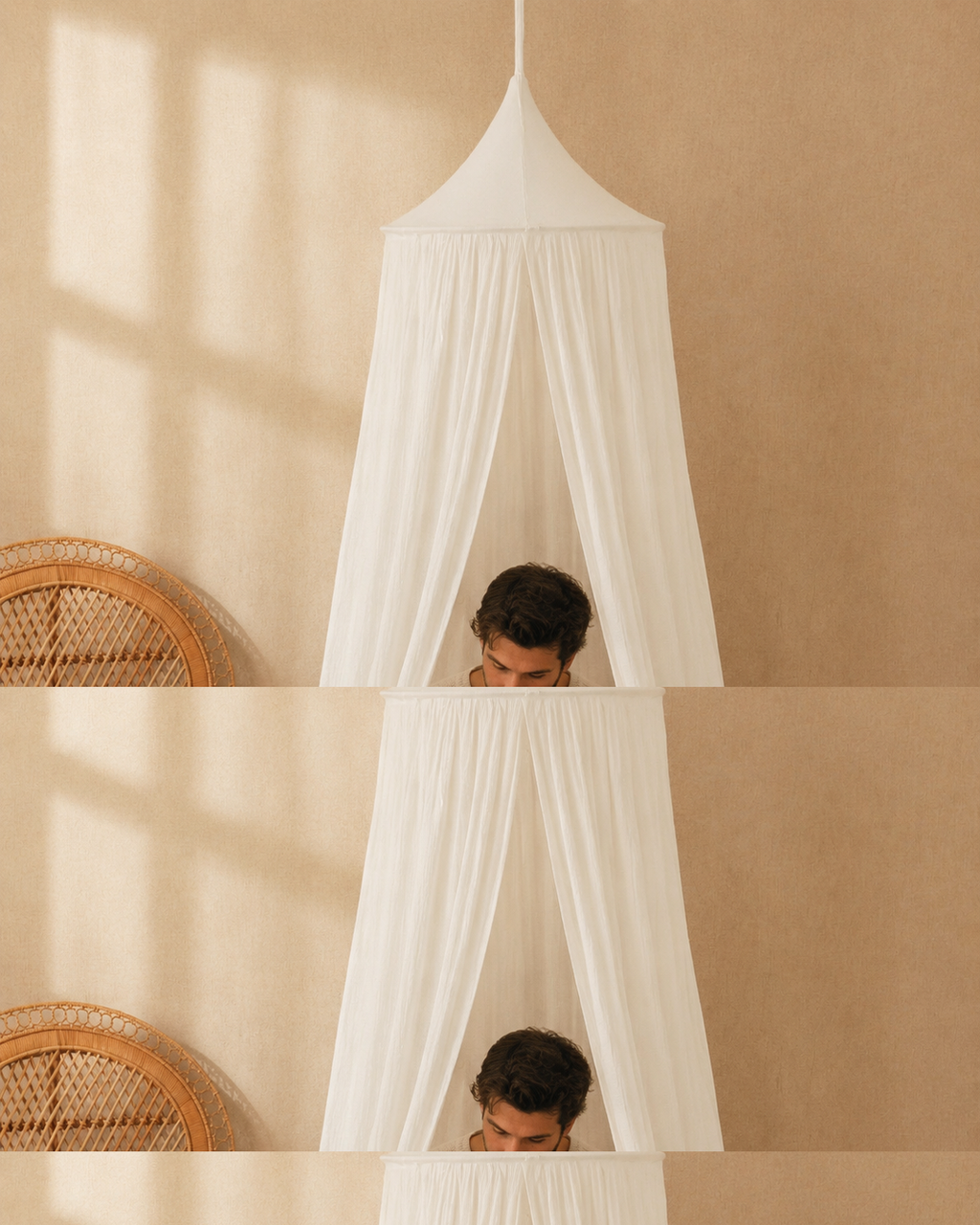 Vater liest mit Kind unter dem Cream Cotton Baldachin