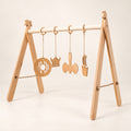 Ewart Woods Baby-Spielbogen aus Holz mit 4 Anhängern – Premium Produktaufnahme