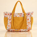 Mom Bag Weekender Flower Power mit floraler Steppung und gelber Fronttasche | Elena Home Living