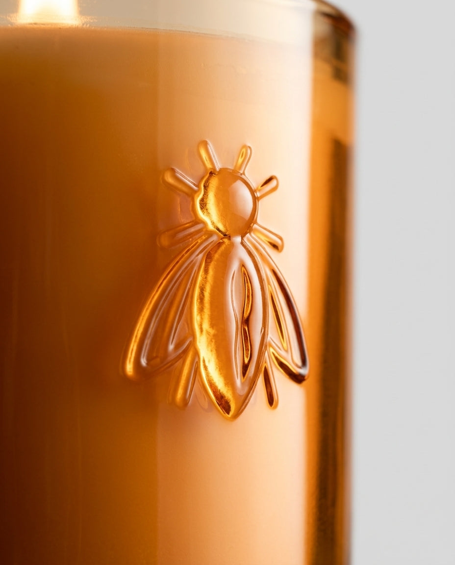 Scented candle in glass jar — Embossed bee detail | Generated by Modelize