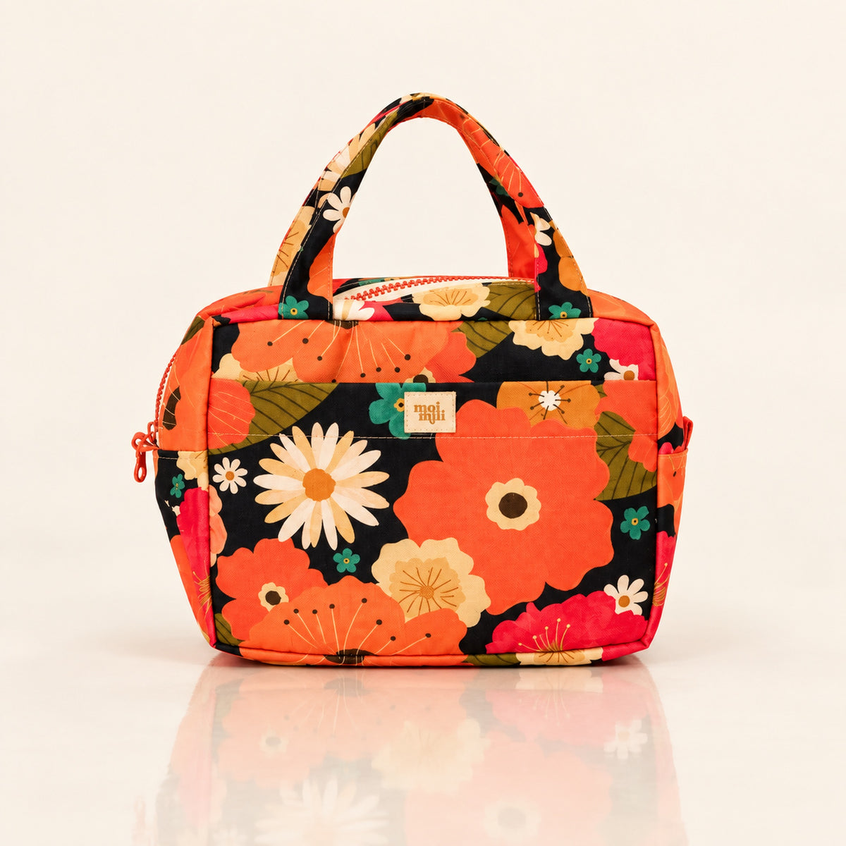 Große Kosmetiktasche Blumenpicknick mit orangefarbenem Blumenmuster auf hellem Spiegelboden