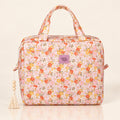 Große Kosmetiktasche Spring Garden mit zartem Blumenmuster auf hellem Spiegelboden